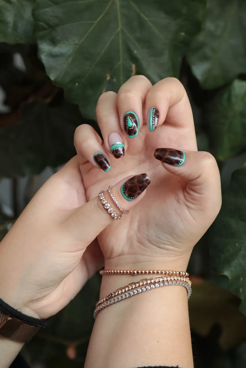 Leopard-print gel nails with mint green tips, by Shalicious Nails in Johannesburg